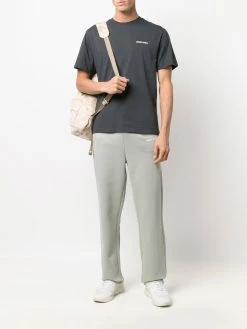 Axel Arigato pantalon de jogging à logo imprimé