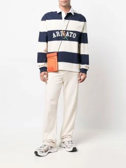 Axel Arigato pantalon de jogging à logo imprimé